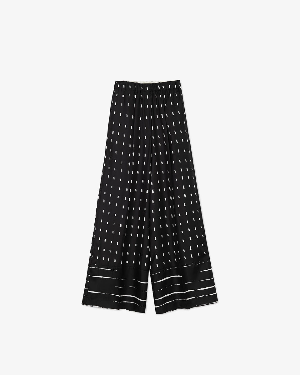Jedwabne, eleganckie spodnie z szeroką, prostą nogawką w kontrastowy print w kropki. Posiadają wysoki stan i są elastyczne w talii. Wykonane z lejącej, śliskiej, jedwabnej tkaniny.