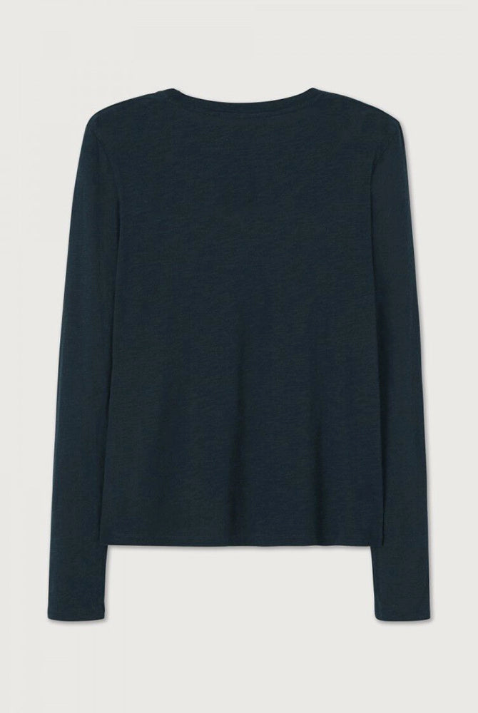 Luźny, cienki, granatowy longsleeve JACKSONVILLE American Vintage z pogłębionym, okrągłym dekoltem i wąskimi rękawami.