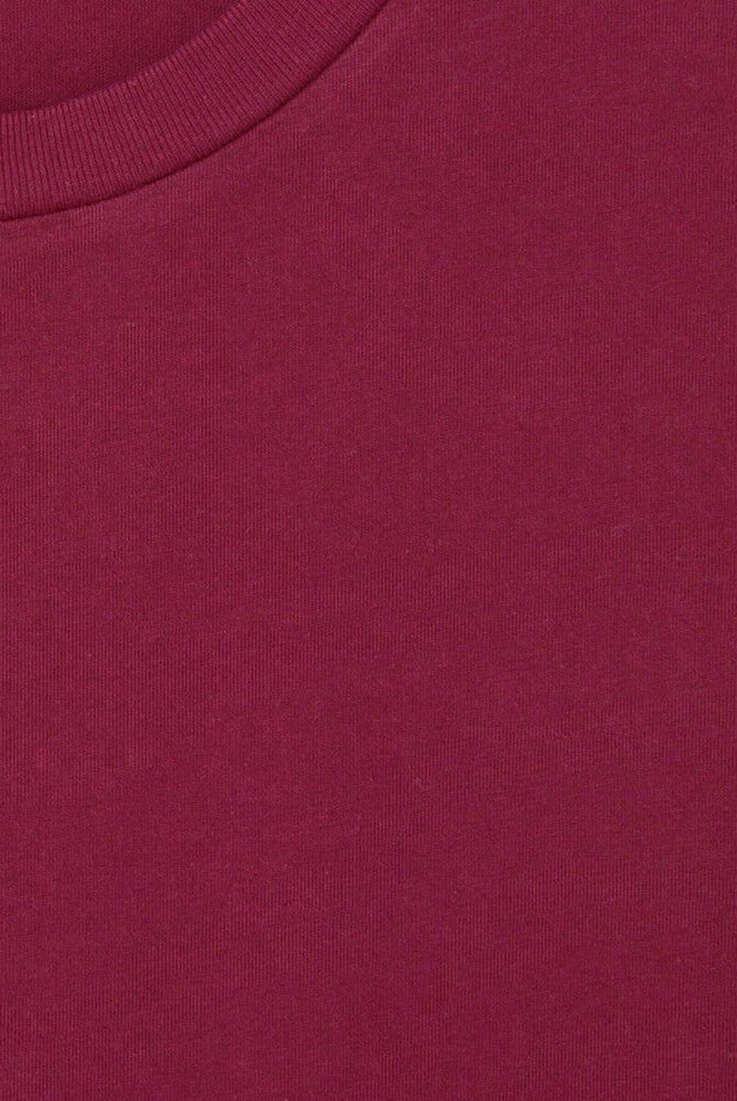 Oversizowy T-shirt unisex FIZVALLEY z krótkim rękawem. Posiada okrągły dekolt i krótki rękaw. Wykonany z grubej bawełny.