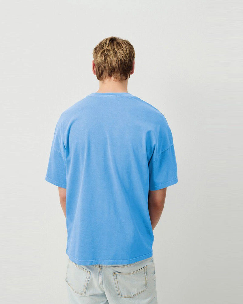 Oversizowy T-shirt unisex FIZVALLEY z krótkim rękawem. Posiada okrągły dekolt i krótki rękaw. Wykonany z grubej bawełny. 