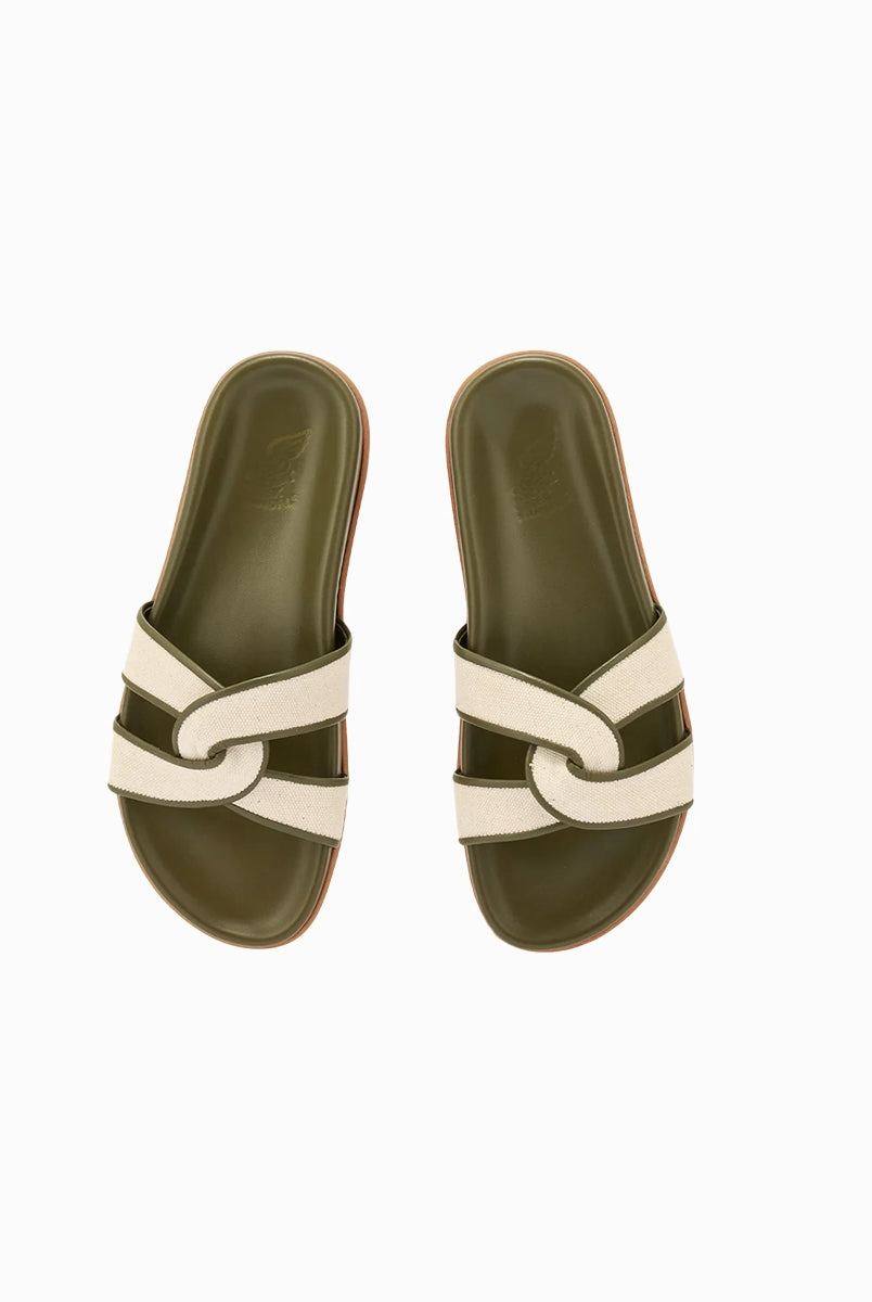 Płaskie, skórzane klapki w kolorze khaki Desmos Ancient Greek Sandals z szerokimi, plecionymi paskami obszytymi bawełnianą, płócienną tkaniną. Wewnętrzna podeszwa klapek jest profilowana.