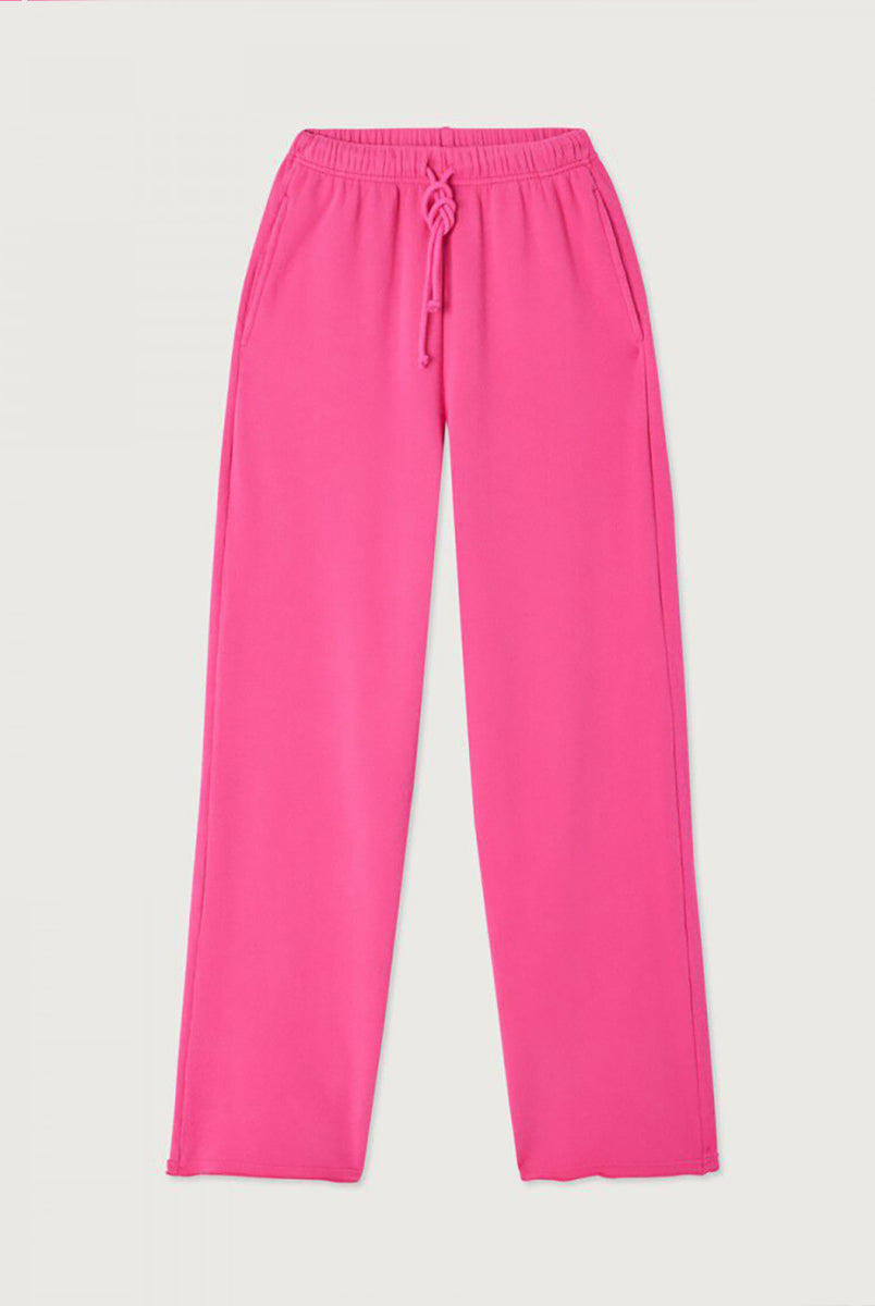 Luźne spodnie dresowe ATU05 Girly francuskiej marki American Vintage z elastyczną talią ze ściąganym sznurkiem i prostą nogawką. Mają dwie kieszenie z przodu i jedną kieszeń naszywaną z tyłu. Wykonane z miękkiej bawełny. 