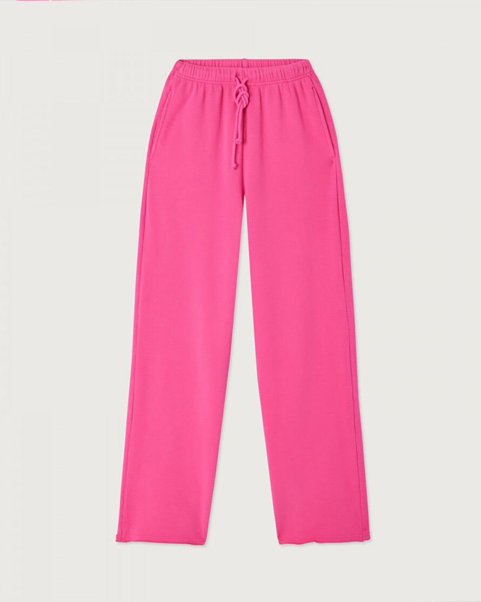 Luźne spodnie dresowe ATU05 Girly francuskiej marki American Vintage z elastyczną talią ze ściąganym sznurkiem i prostą nogawką. Mają dwie kieszenie z przodu i jedną kieszeń naszywaną z tyłu. Wykonane z miękkiej bawełny. 