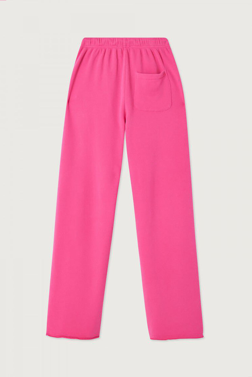 Luźne spodnie dresowe ATU05 Girly francuskiej marki American Vintage z elastyczną talią ze ściąganym sznurkiem i prostą nogawką. Mają dwie kieszenie z przodu i jedną kieszeń naszywaną z tyłu. Wykonane z miękkiej bawełny. 