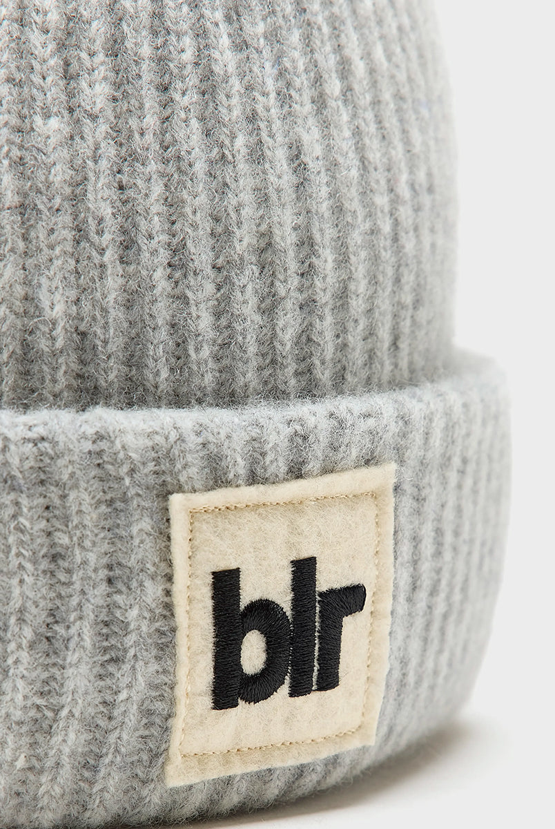 Wełniana, klasyczna, wywijana czapka beanie Gateet Bellerose z prążkowaną fakturą. Posiada naszywkę z logo marki.