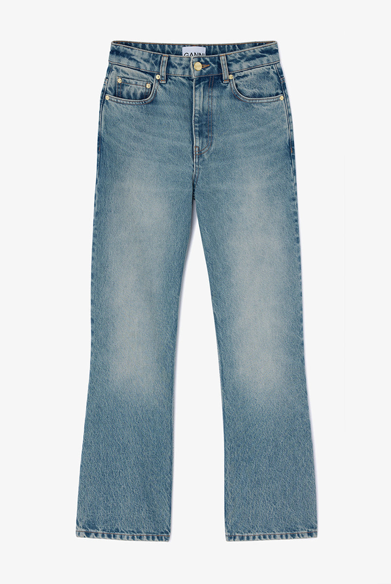iebieskie jeansy z efektem sprania w stylu vintage Betzy GANNI Mid Blue Vintage ze średnim stanem i skróconą, lekko rozszerzaną u dołu nogawką. Dopasowane na biodrach i udach. Posiadają 5 kieszeni i niewielką naszywkę z logo GANNI na lewej, tylnej kieszeni. Wykonane z bawełny organicznej.
-Wysoki stan
-Miękka, bawełniana tkanina
-Skrócona, rozszerzana nogawka
-Zamów spodnie w swoim normalnym rozmiarze