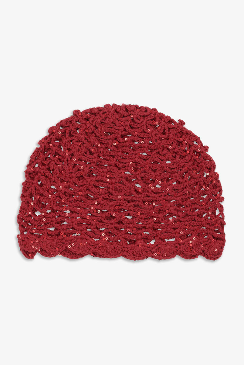 Czapka szydełkowa z cekinami Crochet Sequin SUI AVA to ozdobne nakrycie głowy, wzbogacone delikatnymi cekinami, które pięknie odbijają światło i nadają całości subtelny blask. Lekki, ażurowy splot oraz muszelkowe wykończenie nadają jej kobiecy, elegancki charakter, czyniąc ją idealnym dodatkiem do stylizacji.