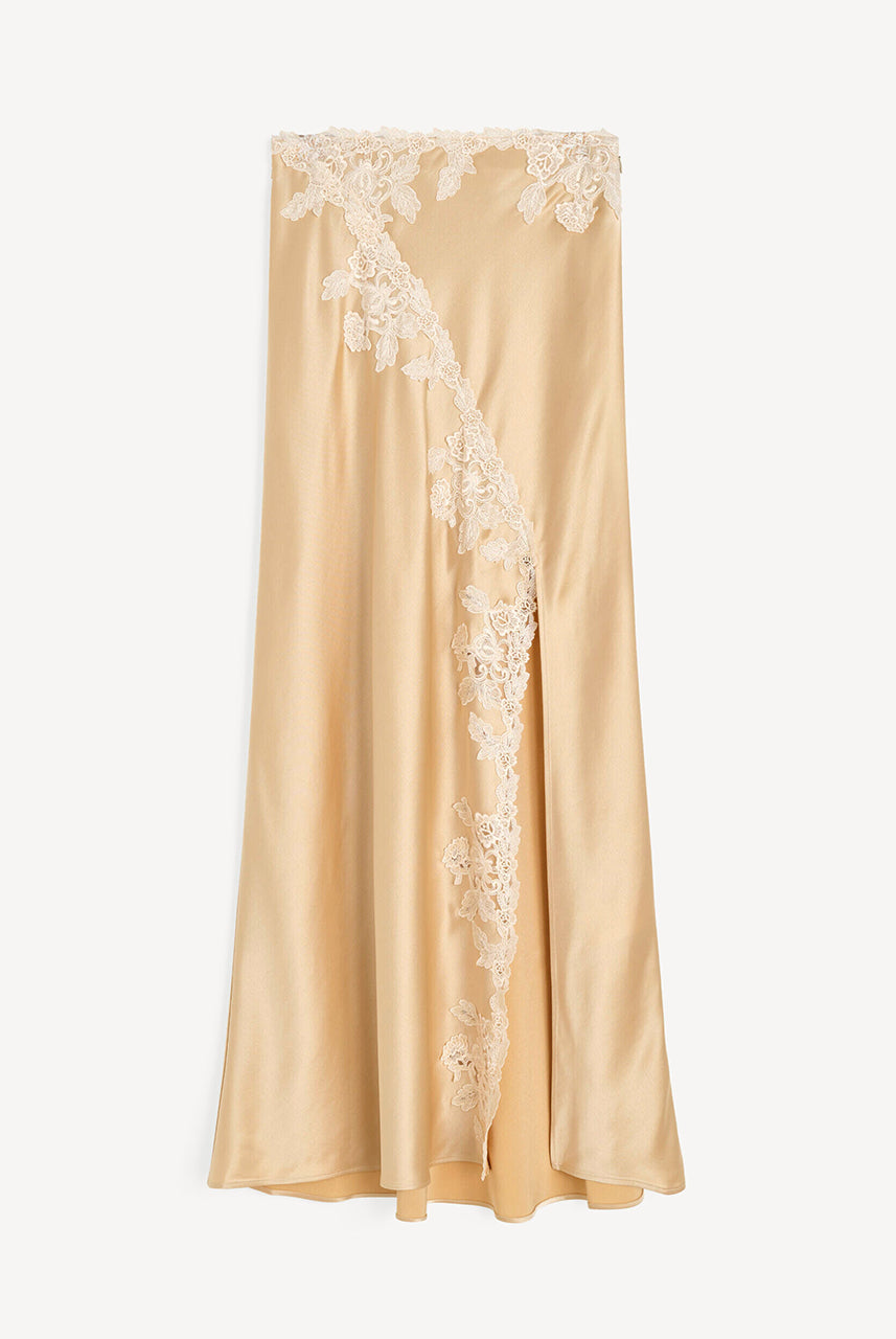 Romantyczna, satynowa, maxi spódnica Erika Vanilla Cream By Malene Birger z koronkowymi detalami w stylu vintage, zapięciem na zamek błyskawiczny i haftkę. Posiada efektowne rozcięcie z przodu. Wykonana z niezwykle miękkiej, szybko schnącej i wygodnej w noszeniu tkaniny.
-Koronkowe wykończenia
-Rozcięcie z przodu
-Zamów spódnicę w swoim standardowym rozmiarze