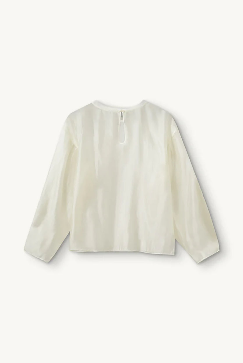 Luźna, kremowa bluzka Gilian Cream marki The Garment z okrągłym dekoltem i szerokimi rękawami o obniżonej linii ramion, zakończone mankietami. Z tyłu widoczne jest eleganckie wycięcie w kształcie łezki, zapinane na guzik. Bluzka wykonana jest z bardzo cienkiego, półtransparentnego materiału o delikatnym połysku.
-Luźny krój
-Cienki materiał o delikatnym połysku
-Zamów bluzkę w swoim standardowym rozmiarze 