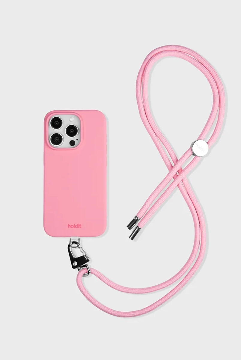Sznurek do telefonu Holdid o regulowanej długości. Idealny do zawieszenia Iphone'a przez ramię. Wykonany z materiałów pochodzących z recyclingu. Łatwo mocuje się do telefonu za pomocą karty paska, którą umieszcza się wewnątrz etui na telefon.