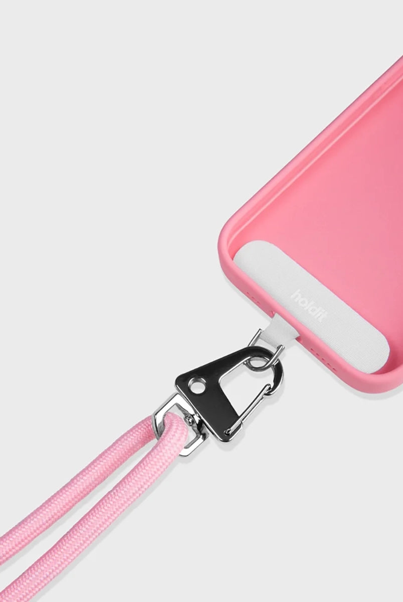 Sznurek do telefonu Holdid o regulowanej długości. Idealny do zawieszenia Iphone'a przez ramię. Wykonany z materiałów pochodzących z recyclingu. Łatwo mocuje się do telefonu za pomocą karty paska, którą umieszcza się wewnątrz etui na telefon.