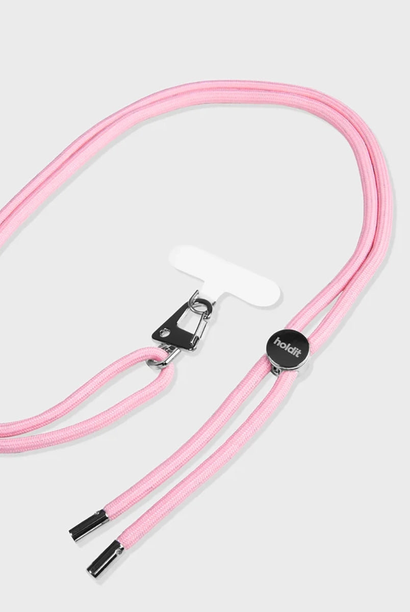 Sznurek do telefonu Holdid o regulowanej długości. Idealny do zawieszenia Iphone'a przez ramię. Wykonany z materiałów pochodzących z recyclingu. Łatwo mocuje się do telefonu za pomocą karty paska, którą umieszcza się wewnątrz etui na telefon.