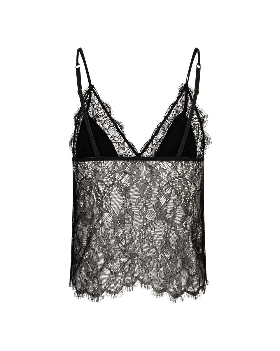 Koronkowy, czarny top Love Lace Long Black marki Love Stories z satynowym biustonoszem trójkątnym bez usztywnień. Dolna część wykonana jest z półprzezroczystej, misternie wzorzystej koronki o nieregularnym, falistym brzegu. Posiada regulowane ramiączka. Ten wszechstronny element garderoby można nosić samodzielnie lub wykorzystywać do tworzenia nowoczesnych, warstwowych stylizacji- świetnie zaprezentuje się nałożony na gładki, klasyczny t-shirt.
-Satynowa część z trójkątnym biustonoszem
-Koronkowe wykończe