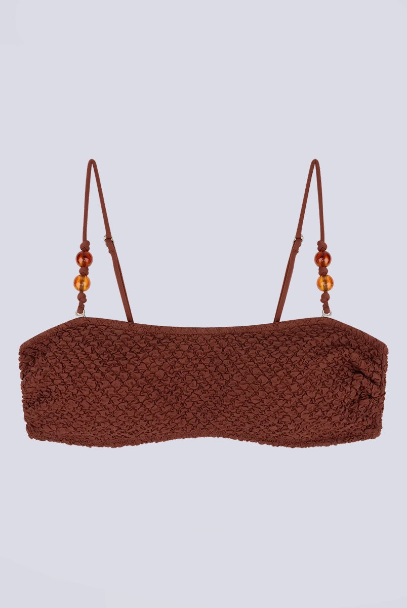 Góra od bikini w stylu bandażowym Bondi Love Stories z utwardzającymi wkładkami. Posiada cienkie, odpinane ramiączka z koralikami. Wykonana z tkaniny z fakturą.