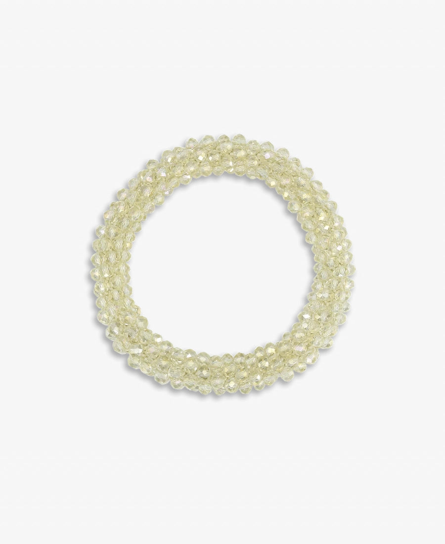 Elastyczna gumka do włosów Beaded SUI AVA wyszywana koralikami . Akcesoria do włosów nie podlegają zwrotowi ani wymianie ze względów higienicznych.