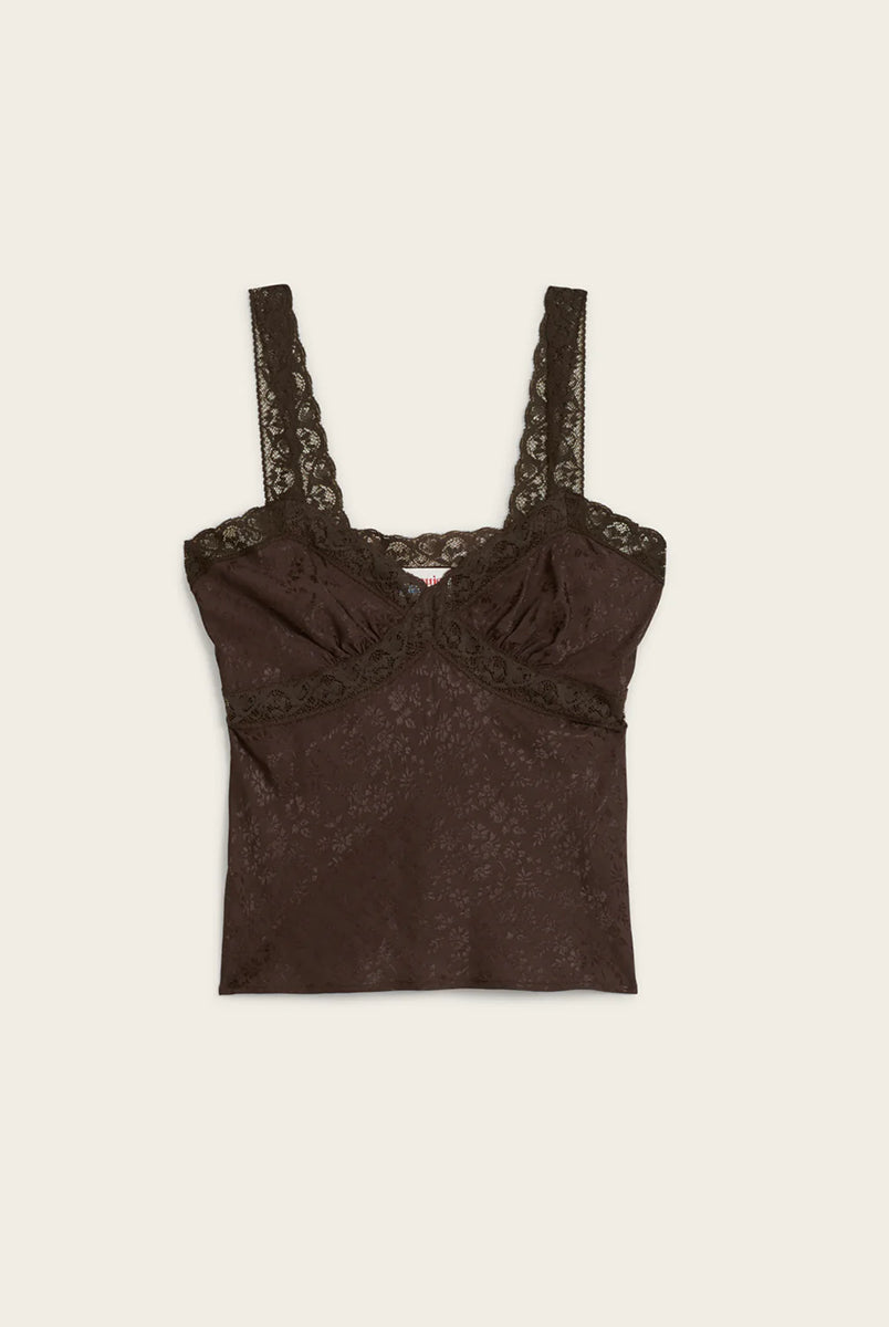 Zwiewny, brązowy top Tacita Jacquard Café z żakardem w kwiaty i koronkowymi zdobieniami. Ma dekolt w serek i ramiączka ozdobione kwiecistą koronką. Wykonany z wiskozy. Zestaw go z beżowymi jeansami, aby uzyskać modny, wiosenny look.
-Koronkowe zdobienia
-100% wiskoza
-Zamów top w swoim standardowym rozmiarze