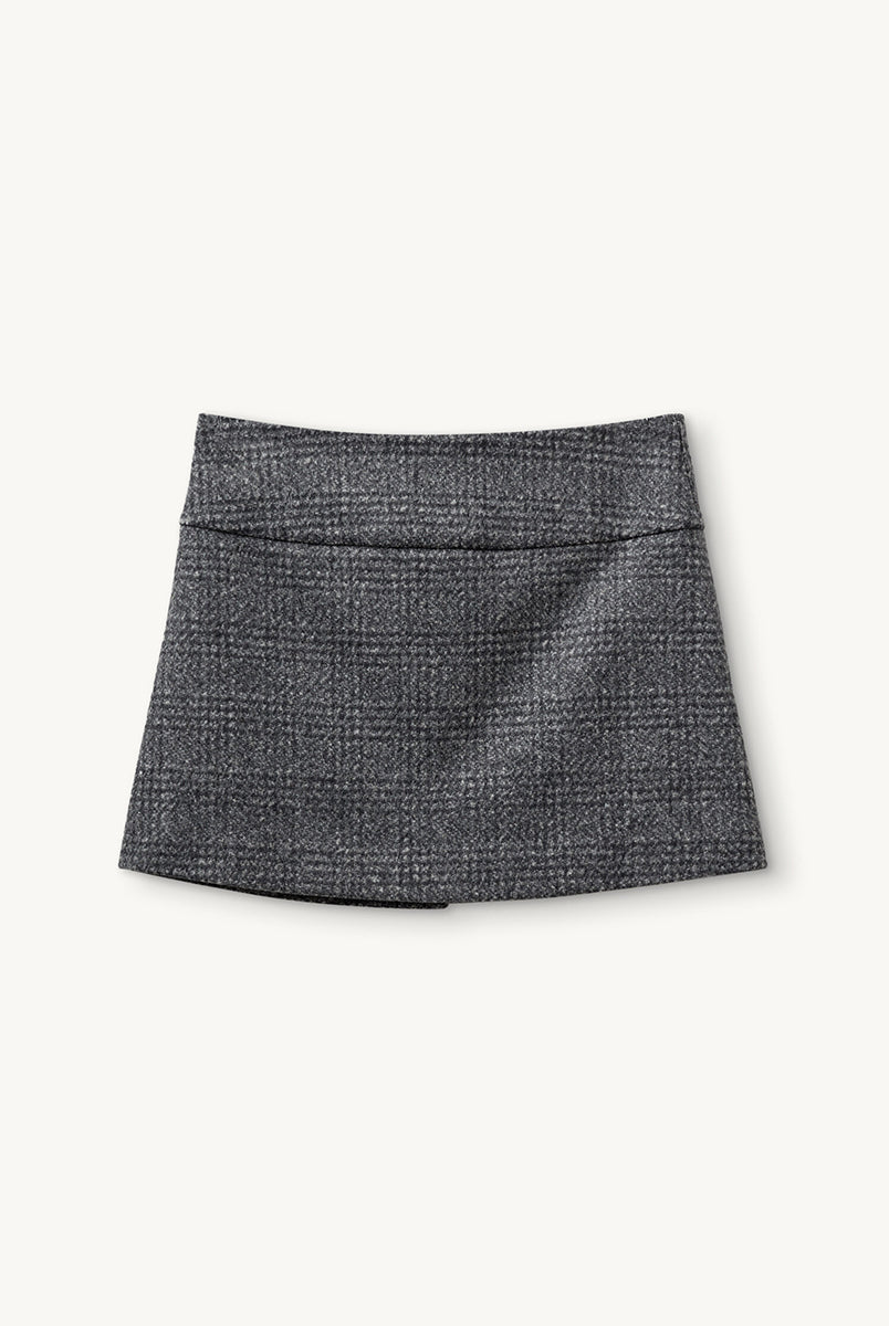 Szara, tweedowa spódnica mini z niskim stanem Brad The Garment w delikatną, czarną kratę. Z boku dekorowana uroczą, białą kokardą