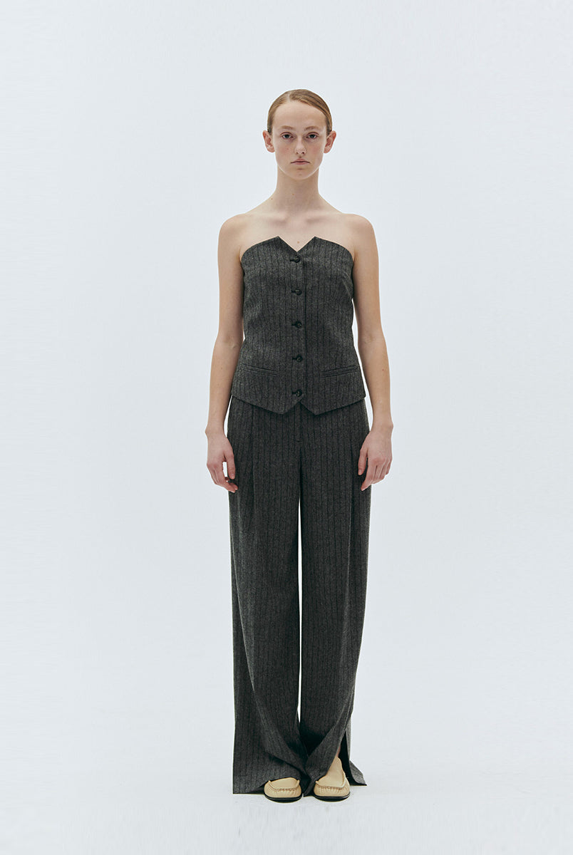 Elegancki top w formie kamizelki bez ramiączek Tilda Tube The Garment. Zapinany na guziki.