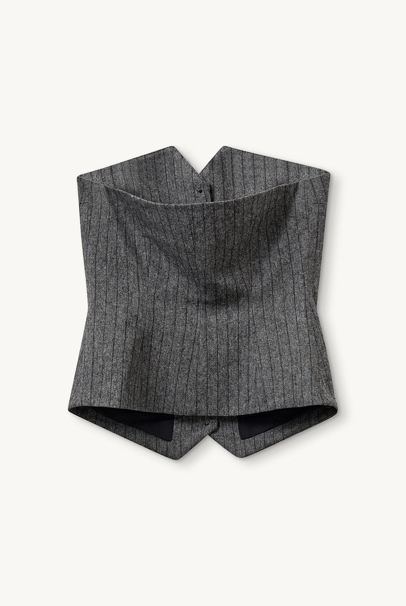Elegancki top w formie kamizelki bez ramiączek Tilda Tube The Garment. Zapinany na guziki.