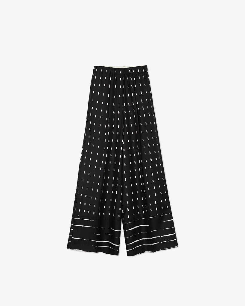 Jedwabne, eleganckie spodnie z szeroką, prostą nogawką w kontrastowy print w kropki. Posiadają wysoki stan i są elastyczne w talii. Wykonane z lejącej, śliskiej, jedwabnej tkaniny. 