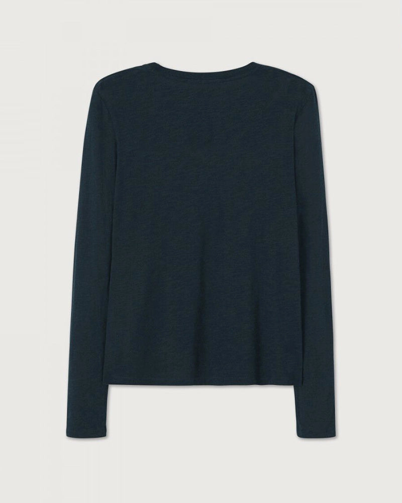 Luźny, cienki, granatowy longsleeve JACKSONVILLE American Vintage z pogłębionym, okrągłym dekoltem i wąskimi rękawami.