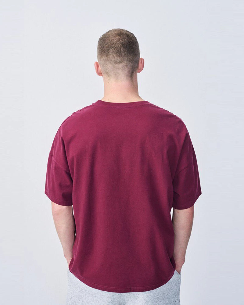 Oversizowy T-shirt unisex FIZVALLEY z krótkim rękawem. Posiada okrągły dekolt i krótki rękaw. Wykonany z grubej bawełny.