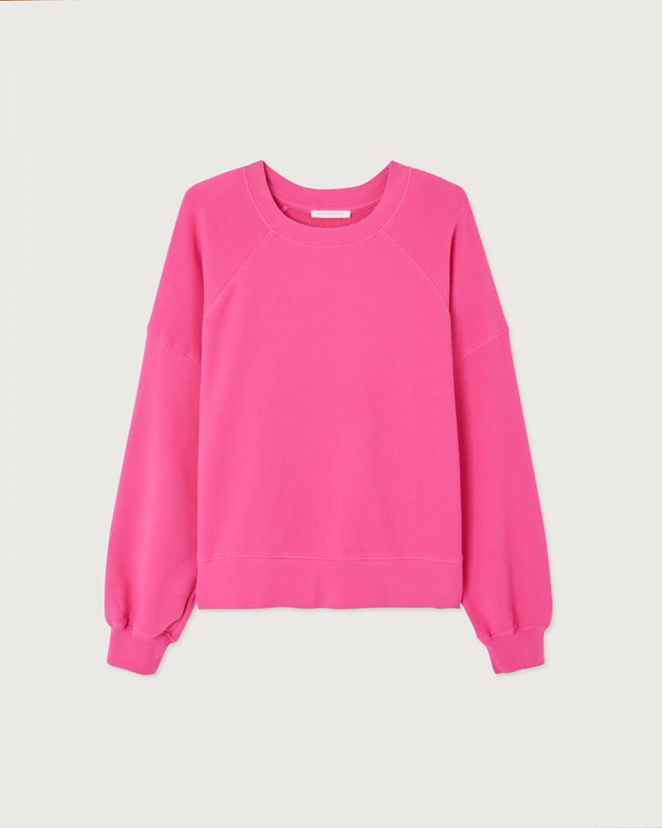 Luźna, bawełniana bluza ATU03 Girly francuskiej marki American Vintage z długimi, raglanowymi rękawami i okrągłym dekoltem. Wykończona ściągaczami. Wykonana z miękkiej, bawełnianej tkaniny. Jest niezbędnym elementem codziennej garderoby, zaprojektowana z myślą o całorocznym noszeniu.