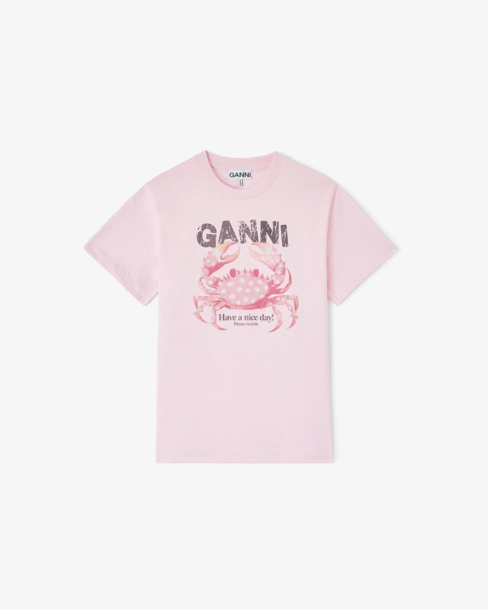 Luźny, bawełniany, różowy t-shirt BASIC COTTON JERSEY Chalk Pink GANNI z okrągłym dekoltem i krótkim, szerokim rękawem. Z przodu posiada grafikę z krabem, która wykończona jest transparentnymi koralikami oraz logo GANNI. Wykonany z miękkiej bawełny organicznej. Idealny z jeansami lub spódnicą.

-Luźny fason

-Miękka bawełna organiczna&nbsp;

-Zamów t-shirt w swoim standardowym rozmiarze. Jeśli chcesz, żeby był bardziej oversizowy - zamów go w większym rozmiarze.
