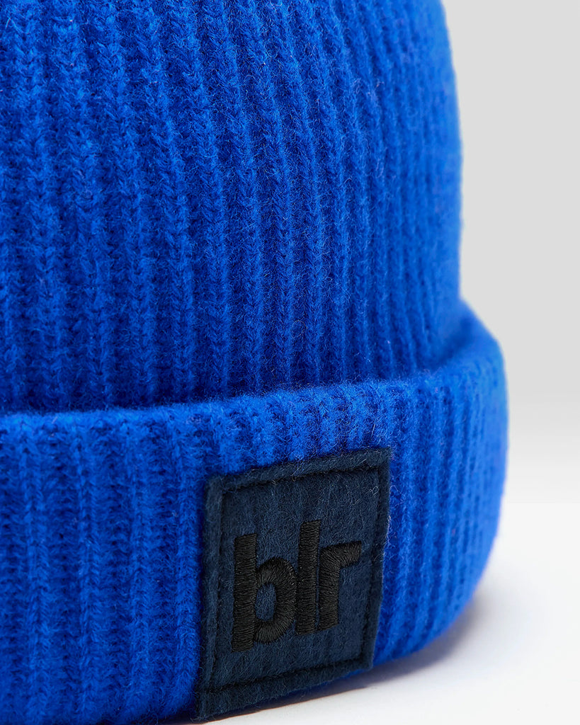 Wełniana, klasyczna, wywijana czapka beanie Gateet Bellerose z prążkowaną fakturą. Posiada naszywkę z logo marki.