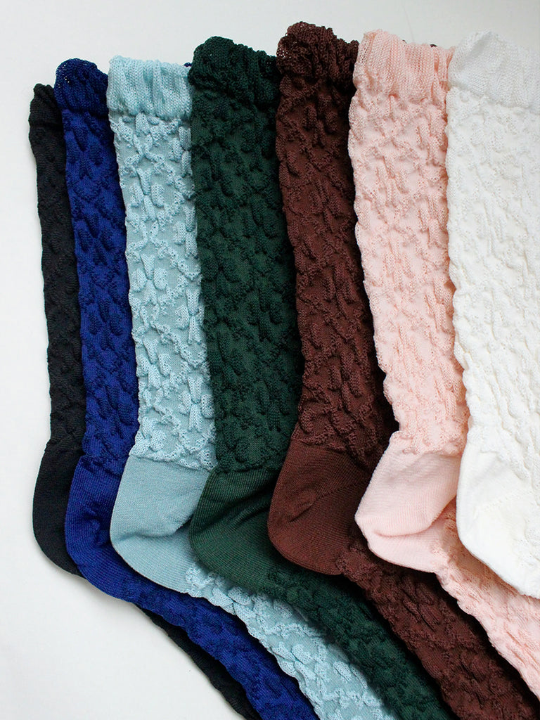 Urocze, jednokolorowe skarpetki Clover Pico Copenhagen z tkanym wzorem koniczyny. Rozmiar uniwersalny.&nbsp;