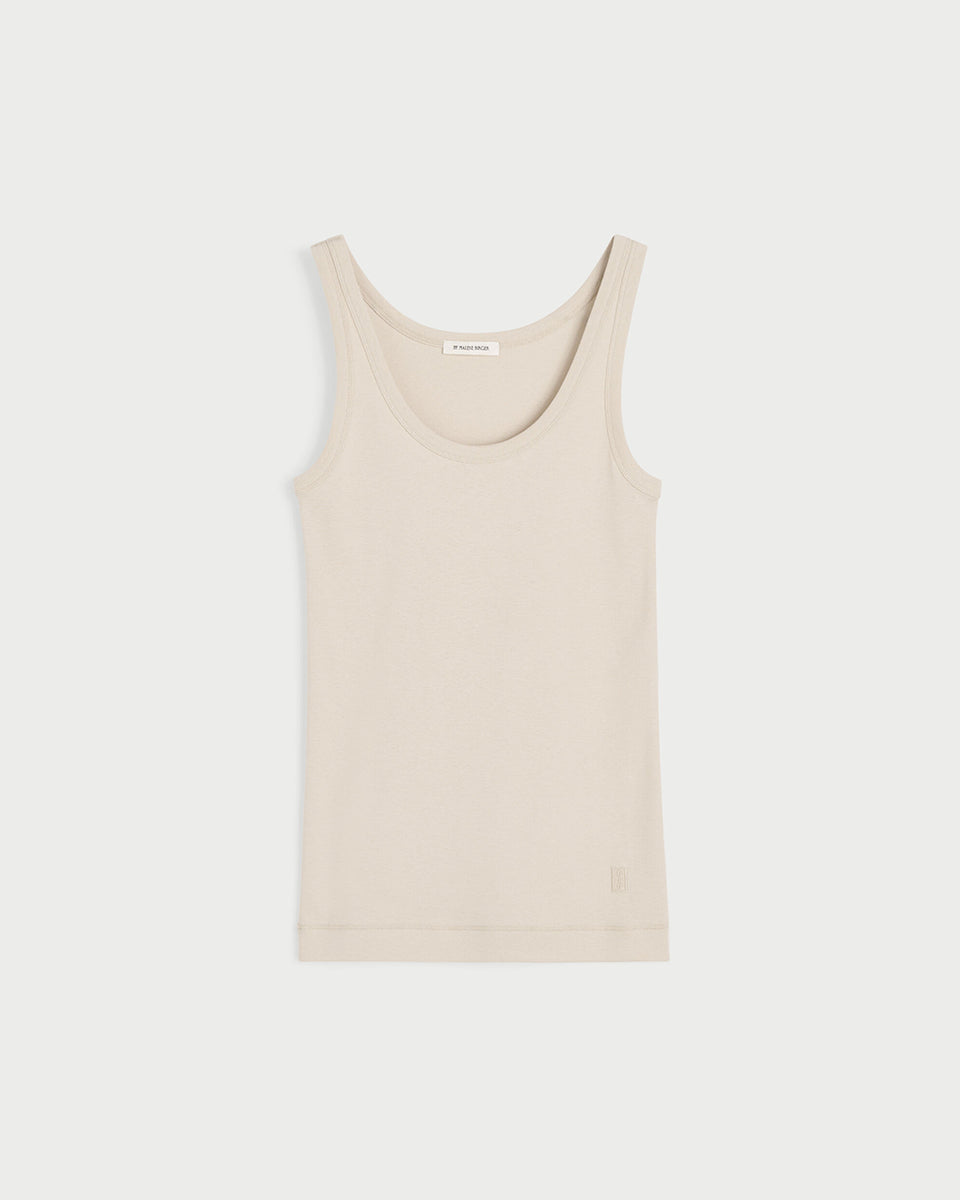 Dopasowany top Dali Oyster Gray By Malene Birger z bawełny organicznej, z głębokim dekoltem i wyhaftowanym logiem. Idealnie sprawdzi się jako baza każdej stylizacji.

-Dopasowany krój

-Głęboki dekolt

-Zamów top w swoim standardowym rozmiarze