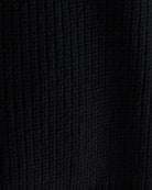 Luźny, krótki sweter z okrągłym dekoltem Dorou Black marki Bellerose wykonany z czarnej wełny merino, o średniej grubości dzianiny z panelami strukturalnymi. Posiada długie rękawy oraz ściągacze na mankietach i u dołu.

-Luźny krój: celowo powiększony, aby uzyskać obszerny wygląd.

-Krótszy fason