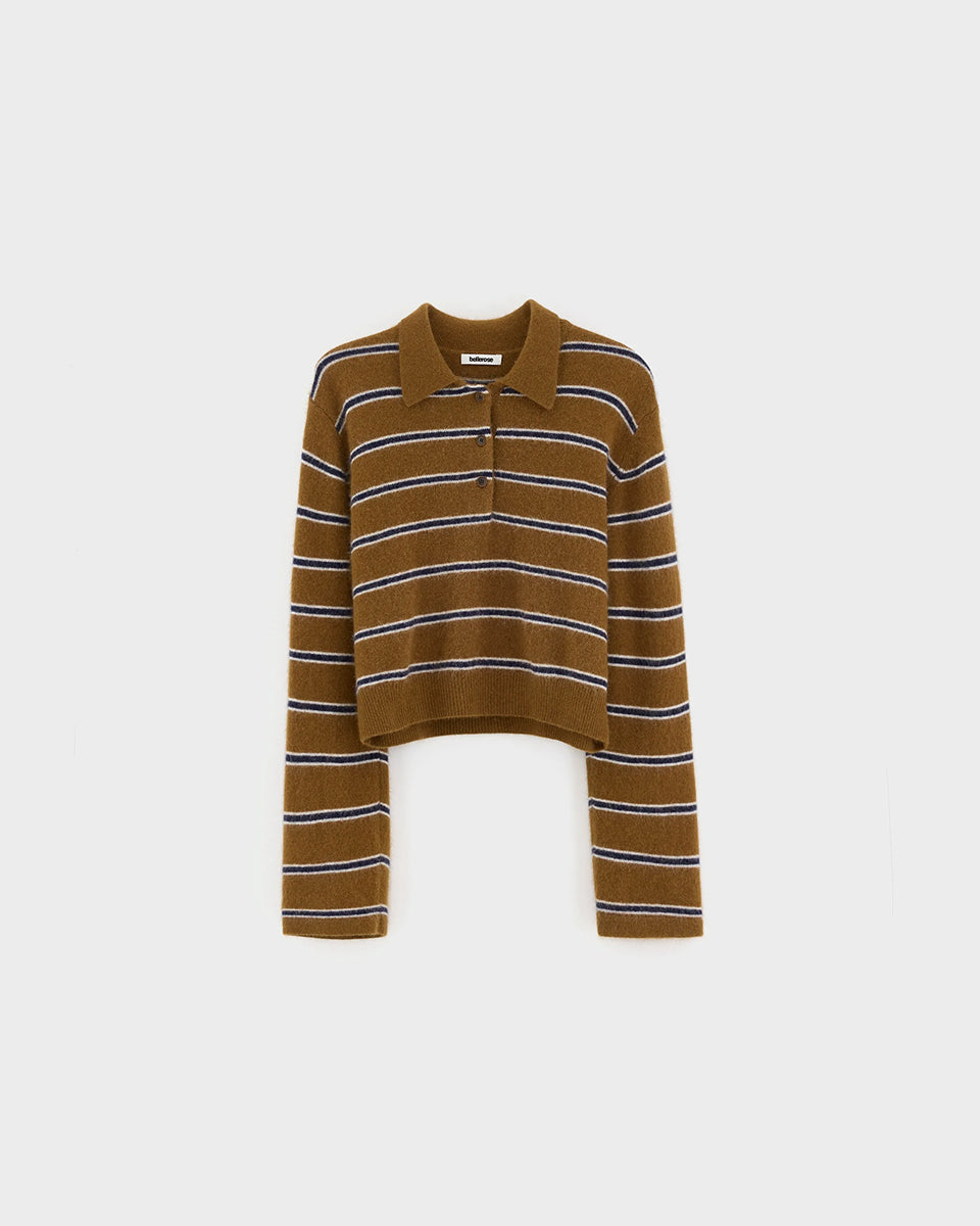 Sweter polo w paski Dussyr Polo Stripe marki Bellerose w ciepłym odcieniu camel z granatowymi i ecru pasami. Wykonany z niezwykle miękkiej przędzy z domieszką włosia jenota, o lekko puszystym wykończeniu. Ma długie rękawy i kołnierzyk typu polo z listwą guzikową. Krój regularny.&nbsp;

-Lekko puszysta faktura

-Kołnierzyk polo

-Zamów kardigan w swoim normalnym rozmiarze