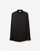Klasyczna, minimalistyczna koszula Silk FILIPPA K o luźnym fasonie i prostym kroju. Posiada kołnierzyk i jest zapinana na guziki. Wykonana z luksusowego, lekko elastycznego jedwabiu.