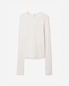 Luźny, minimalistyczny longsleeve Filippa K z okrągłym dekoltem i długimi rękawami. Top ma prosty krój. Jest wykonany z bardzo miękkiej i lejącej tkaniny z prążkowaną fakturą.
