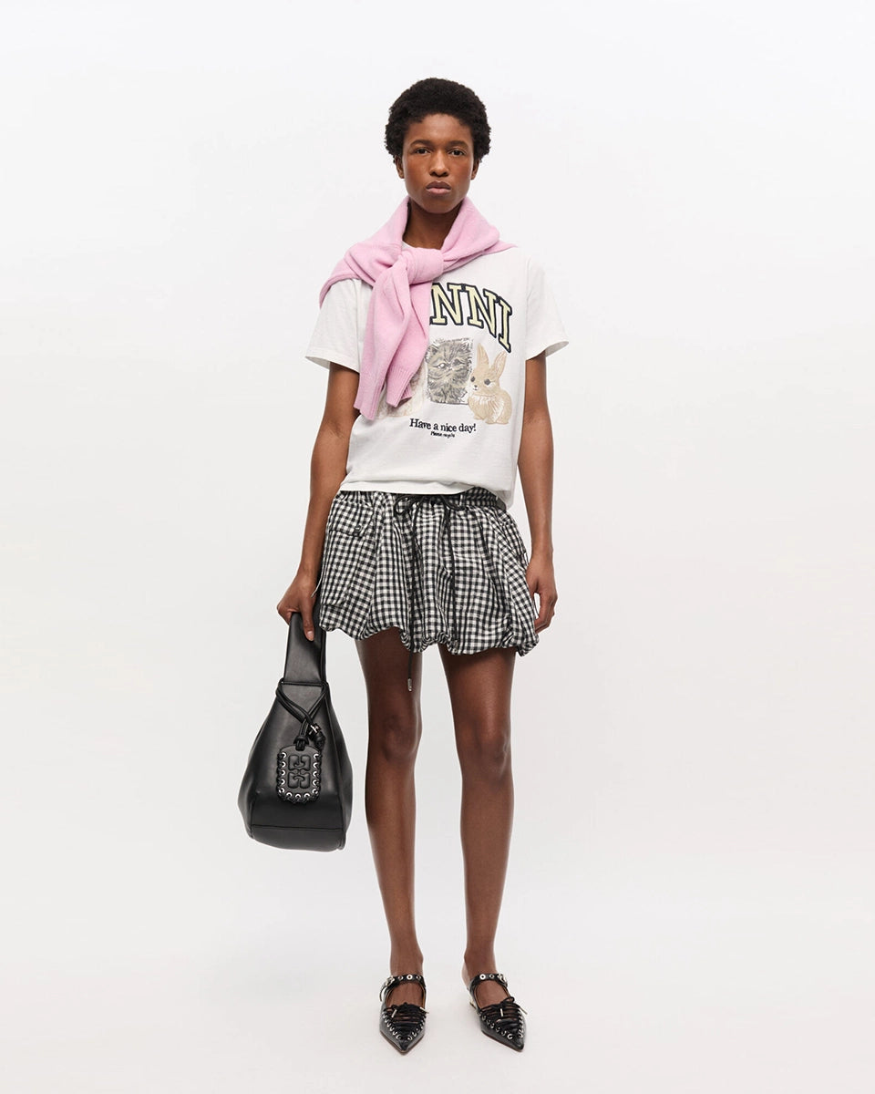 Luźny, bawełniany, biały t-shirt 4238 BASIC COTTON JERSEY ANIMAL GANNI z okrągłym dekoltem i krótkim, szerokim rękawem. Z przodu posiada grafikę uroczych zwierzątek, napis 'Have a nice day' oraz logo GANNI.