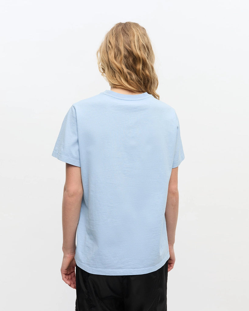 Luźny, bawełniany, niebieski t-shirt 4278 BASIC COTTON JERSEY ANIMAL GANNI z okrągłym dekoltem i krótkim, szerokim rękawem. Z przodu posiada grafikę z uroczymi zwierzątkami, napis 'Have a nice day' oraz logo GANNI. 