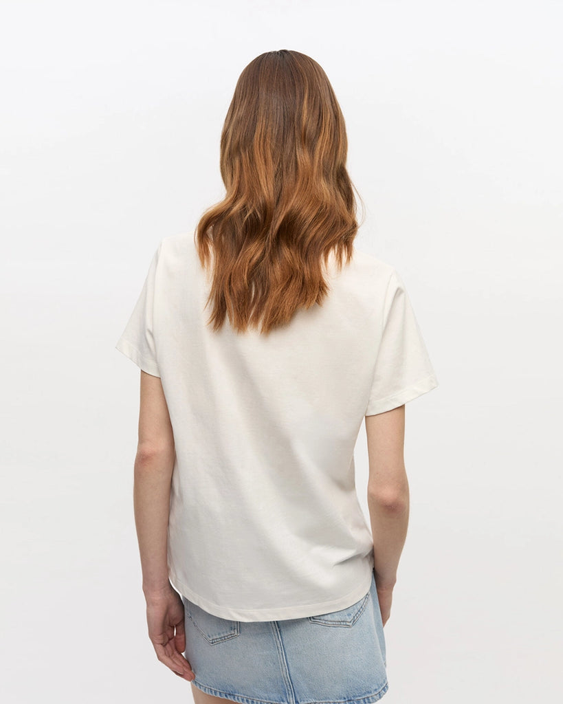 Luźny, bawełniany t-shirt 4278 BASIC COTTON JERSEY GRAPES GANNI z okrągłym dekoltem i krótkim, szerokim rękawem. Z przodu posiada grafikę z winogronami, napis 'Have a nice day' oraz logo GANNI. 