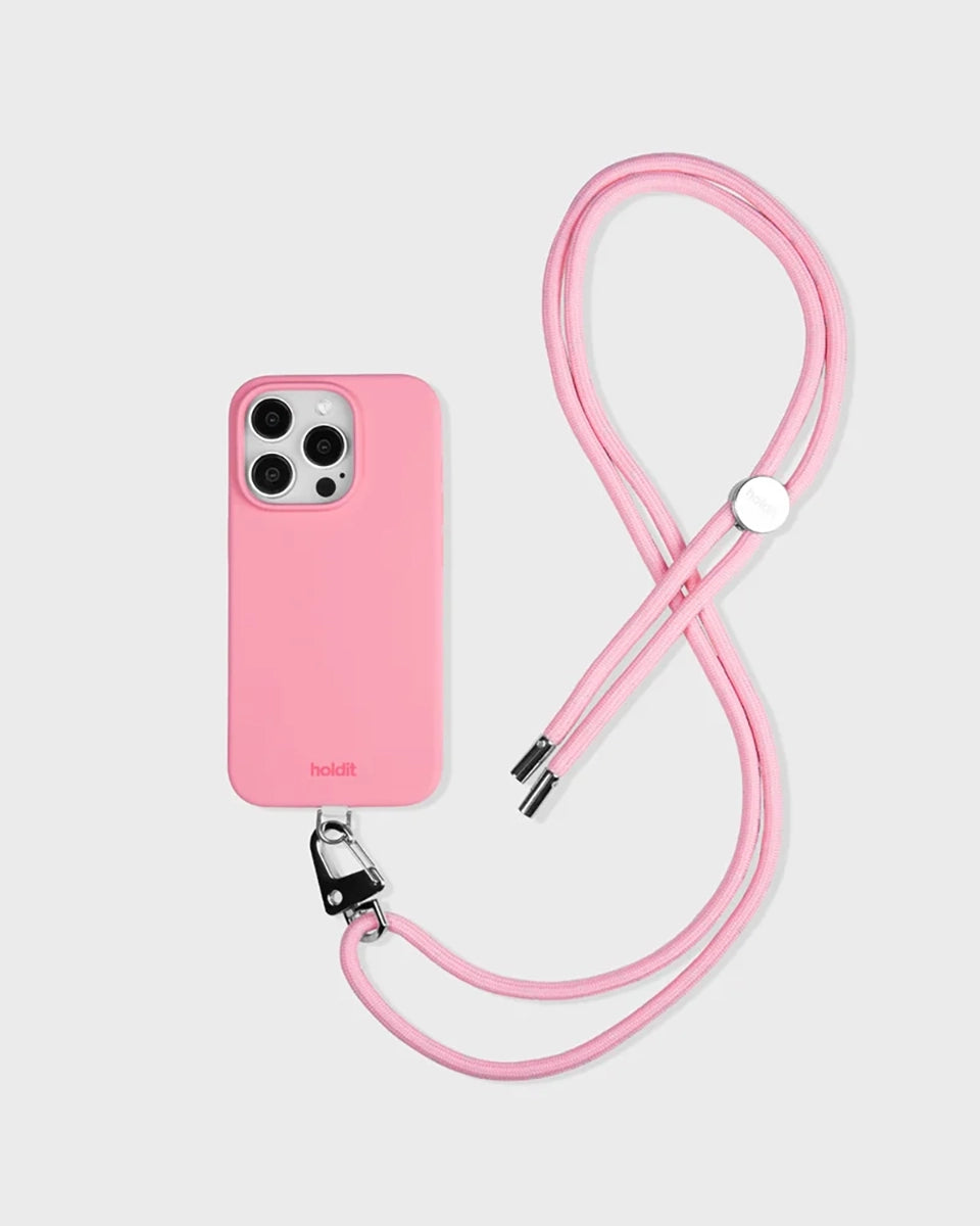 Sznurek do telefonu Holdid o regulowanej długości. Idealny do zawieszenia Iphone'a przez ramię. Wykonany z materiałów pochodzących z recyclingu. Łatwo mocuje się do telefonu za pomocą karty paska, którą umieszcza się wewnątrz etui na telefon.