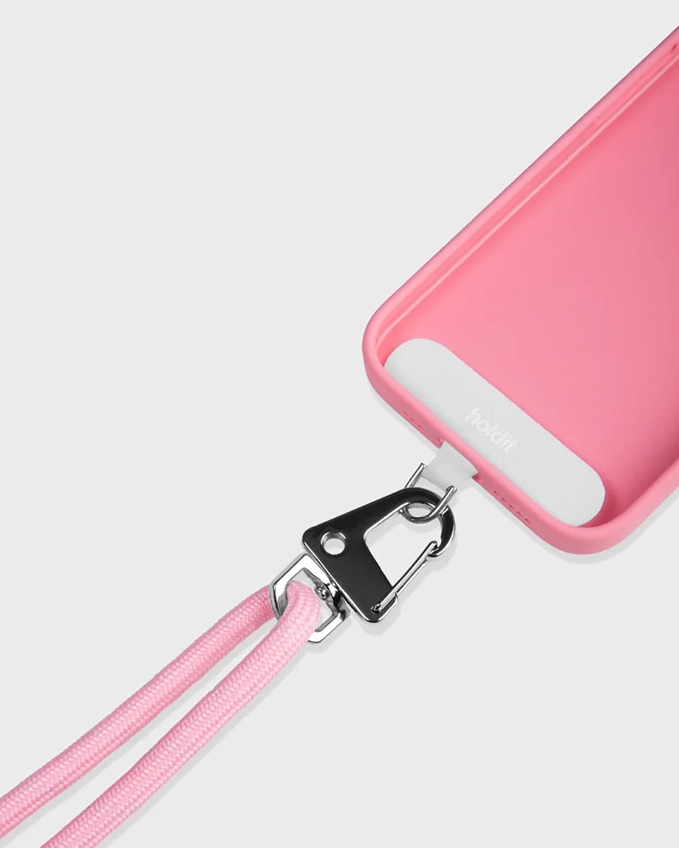 Sznurek do telefonu Holdid o regulowanej długości. Idealny do zawieszenia Iphone'a przez ramię. Wykonany z materiałów pochodzących z recyclingu. Łatwo mocuje się do telefonu za pomocą karty paska, którą umieszcza się wewnątrz etui na telefon.