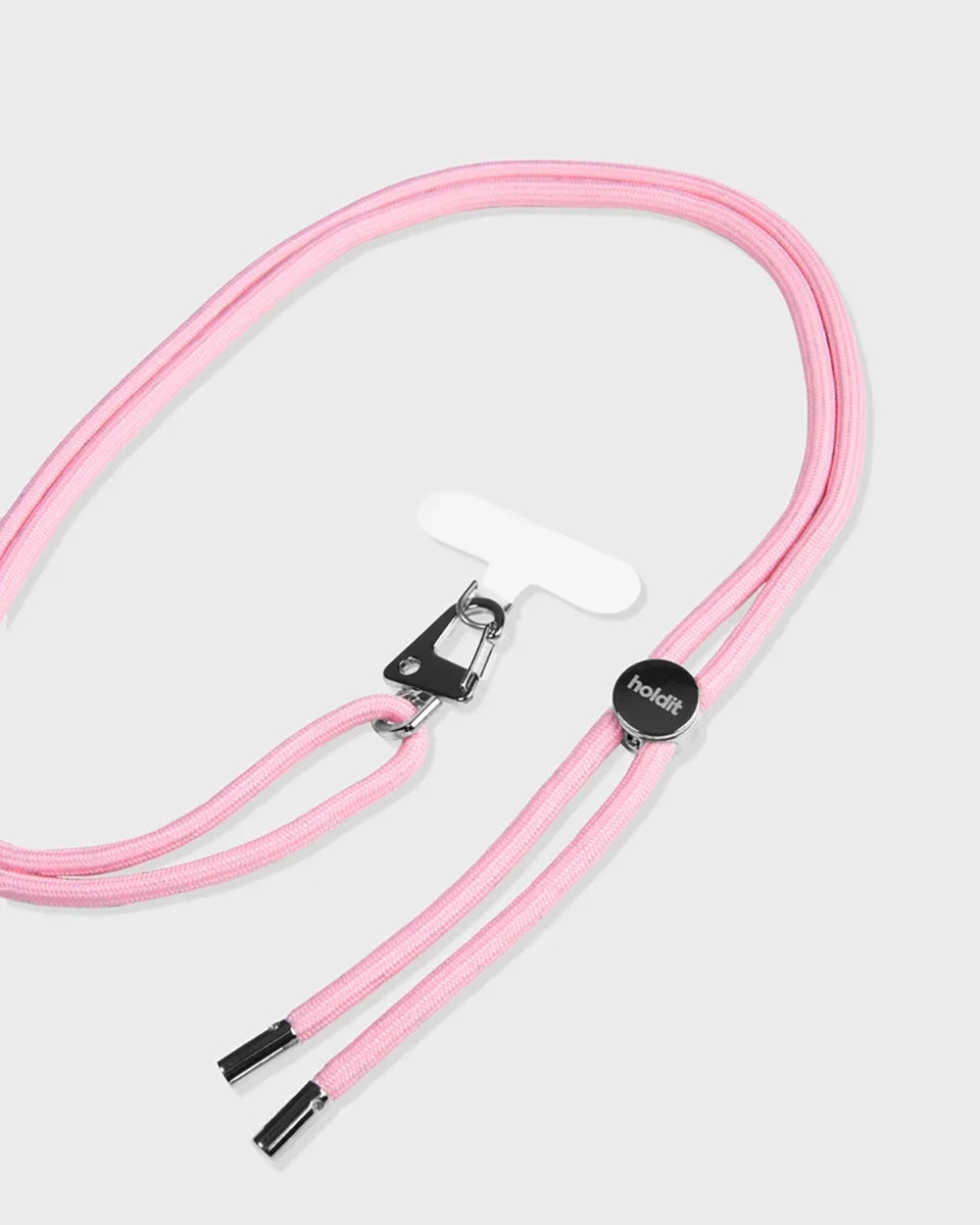 Sznurek do telefonu Holdid o regulowanej długości. Idealny do zawieszenia Iphone'a przez ramię. Wykonany z materiałów pochodzących z recyclingu. Łatwo mocuje się do telefonu za pomocą karty paska, którą umieszcza się wewnątrz etui na telefon.