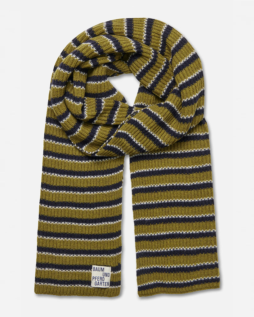 Ciepły szalik Leora Green Strip w paski o przytulnej, prążkowanej fakturze, który zapewnia stylowy wygląd. Wykonany z miękkiej dzianiny z wełną. Posiada niewielką metkę z logo marki. Połącz go z pasującą czapką Leia, aby stworzyć idealny zestaw.&nbsp;