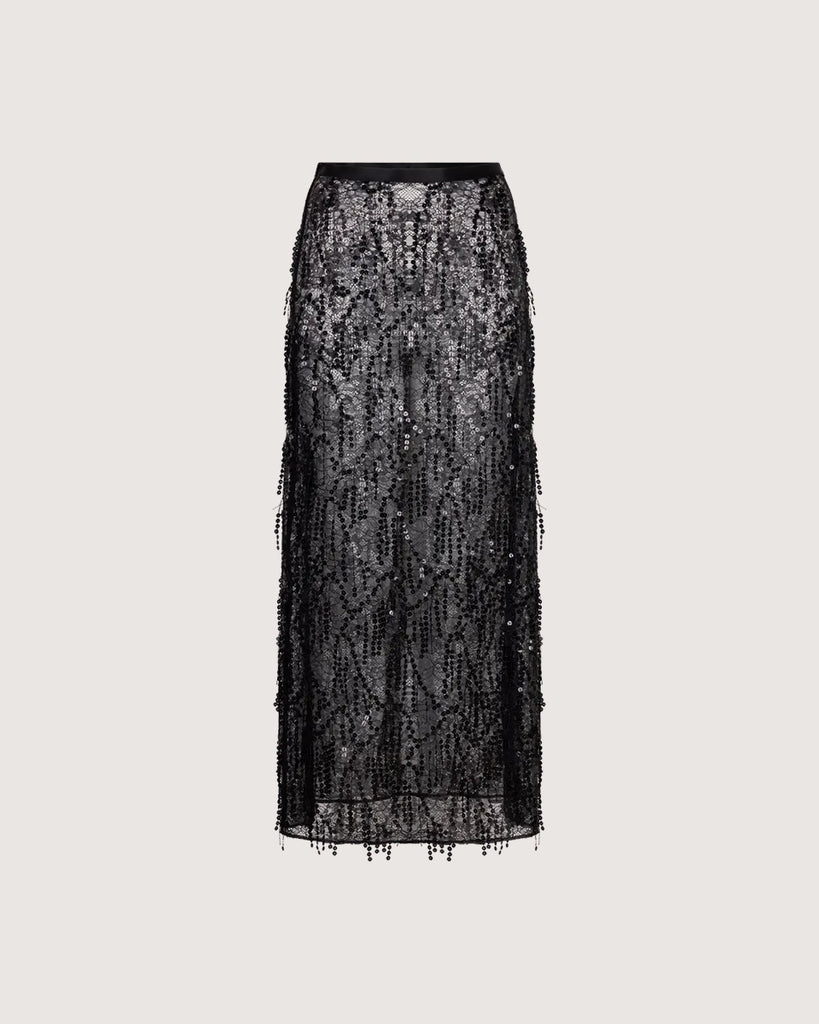 Czarna, transparentna, koronkowa spódnica midi Mia Love Stories z wysokim stanem i elastyczną talią. Posiada długość przed kostki. Idealna do luźnego swetra lub oversizowej koszuli.