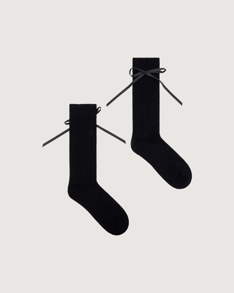 Długie, czarne skarpetki z kaszmirem Love Stories z uroczymi kokardkami. Wykonane z dzianiny z prążkowaną fakturą.