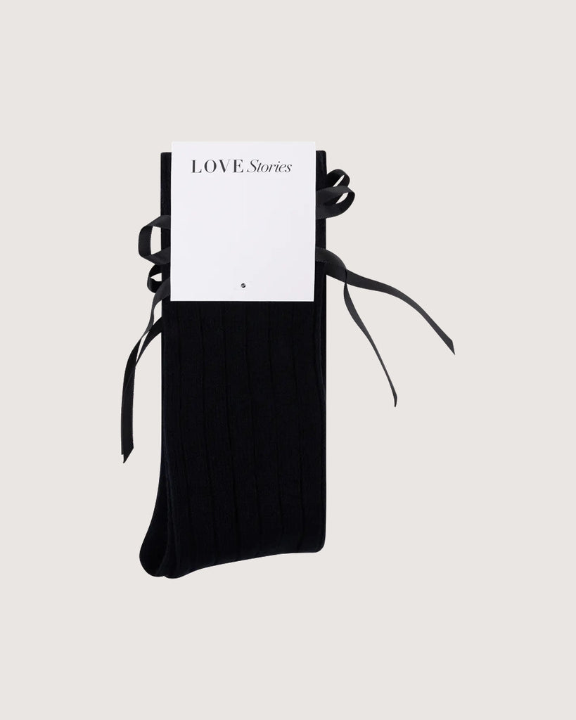 Długie, czarne skarpetki z kaszmirem Love Stories z uroczymi kokardkami. Wykonane z dzianiny z prążkowaną fakturą.