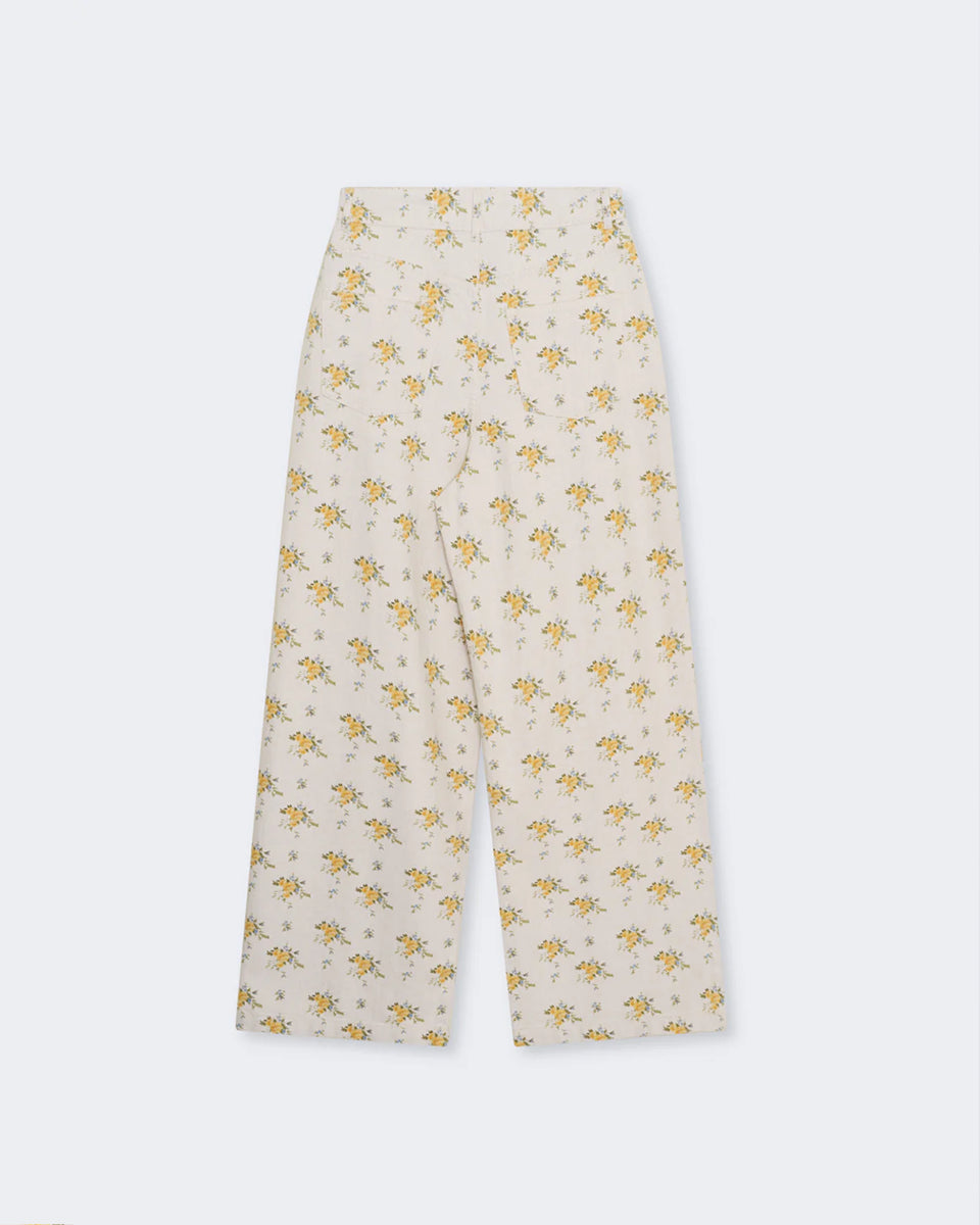 Luźne, jeansowe spodnie typu wide-leg z plisami Mimosa Print ozdobione pięknym, kwiatowym nadrukiem. Mają wysoki stan i szeroką nogawkę. Posiadają kieszenie boczne oraz kieszenie z tyłu. Wykonane z połączenia bawełny organicznej i lnu.&nbsp;

-Luźny fason

-Wysoki stan

-Zamów spodnie w swoim standardowym rozmiarze