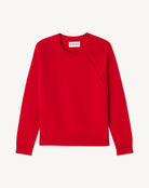 Luźny prosty sweter MO2857 Rouge w czerwonym kolorze z okrągłym dekoltem, raglanowym, długimi rękawami i zdobionym splocie przy ramionach. Sweter ma klasyczną długość. Wykonany w 100% z kaszmiru.&nbsp;