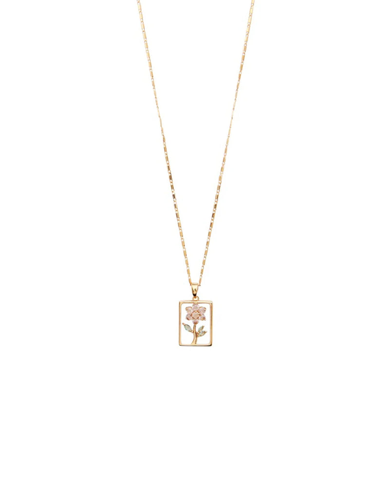 Uroczy naszyjnik Bloom Powder Pico Copenhagen z różowym kwiatuszkiem w ramce.&nbsp;

Bez niklu.&nbsp;