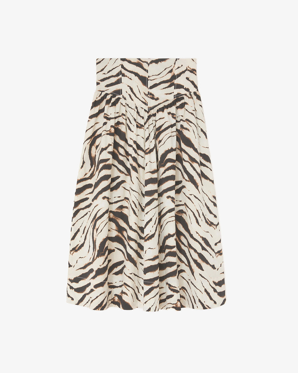 Długa, maxi spódnica Printed Long Skirt GANNI Egret wyróżnia się wyrazistym, zwierzęcym motywem tygrysich pasów. Ma trapezowy, lekko rozszerzany ku dołowi krój o swobodnej linii oraz obniżoną talię. Z tyłu posiada elastyczne marszczenie. Spódnica sięga do polowy łydki i świetnie prezentuje się w stylizacjach z prostymi t-shirtami oraz płaskimi butami. Wykonana z bawełny i elastanu.&nbsp;

-Zwierzęcy, wyrazisty print

-Długość maxi

-Bawełniana tkanina z elastanem