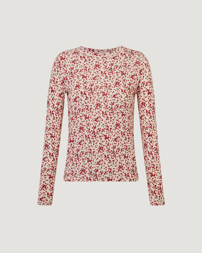 Dopasowany, prosty longsleeve Timothee Rouje w drobny, kwiatowy print. Posiada okrągły dekolt obszyty delikatną koronką i wąskie rękawy. Wykonany z miękkiej, lekko ażurowej tkaniny.